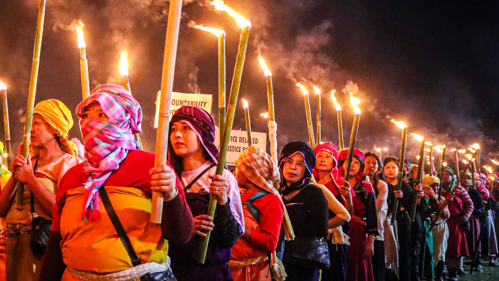 Protestors take part in a Meira (torch) rally at Koirengei, organised under the aegis of Coordinating Committee on Manipur Integrity (COCOMI), demanding justice regarding the Tronglaobi killing incident, in Imphal East on Sunday. (ANI Photo)