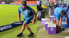 The video shows Hayden quietly collecting discarded items and placing them in a dustbin