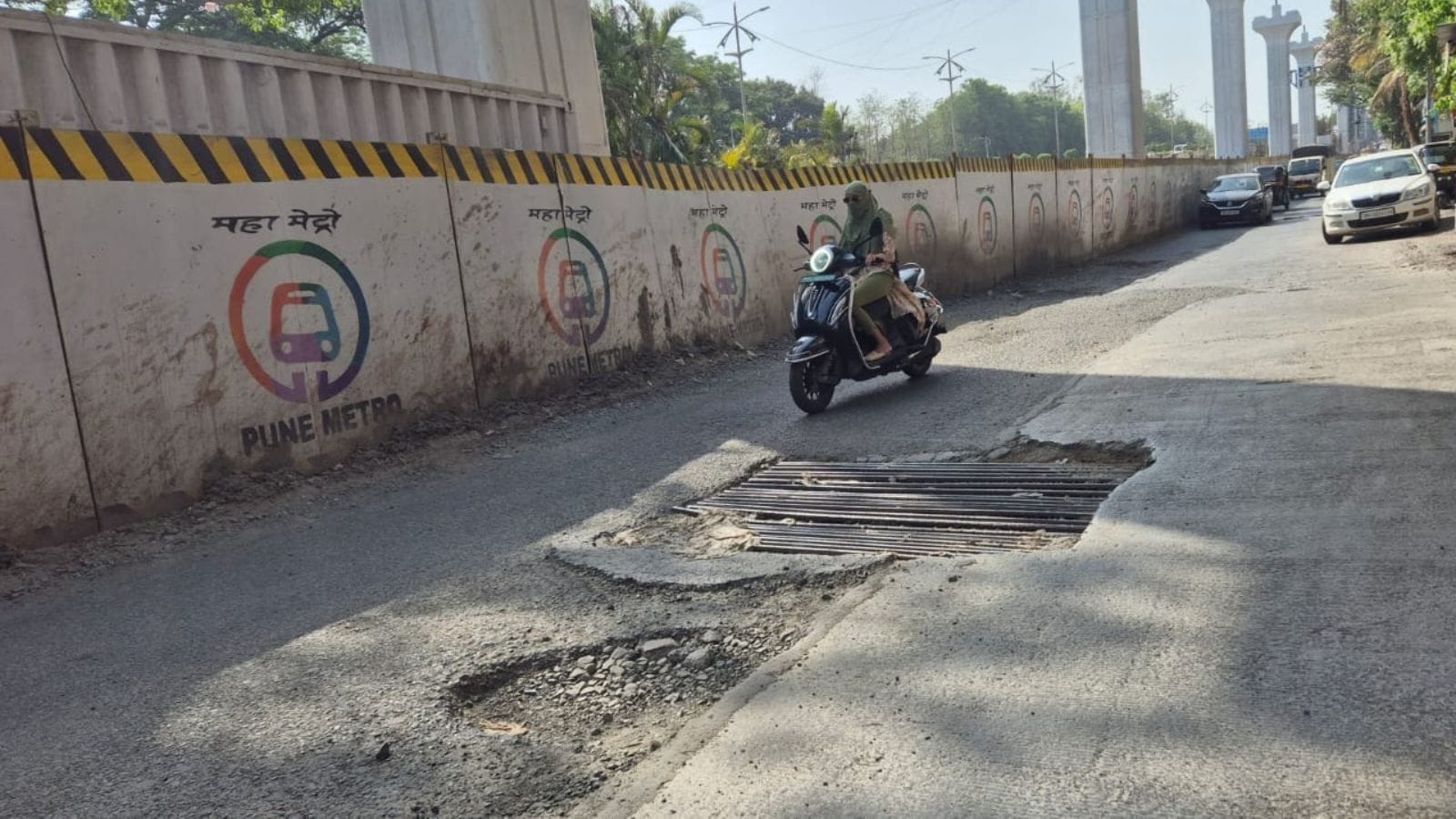 Damaged chambers, potholes turn Nigdi-Pimpri service road into daily ordeal