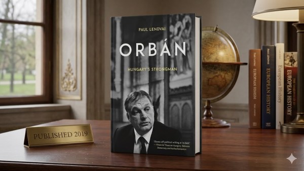 The book cover of Orban: Hungary's Strongman by Paul Lendvai standing on a desk 