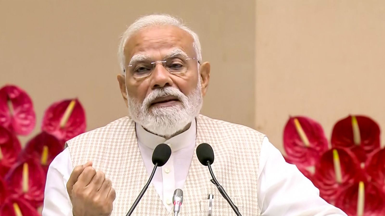 Prime Minister Narendra Modi addresses during the national level 'Nari Shakti Vandan Sammelan', in New Delhi (DD/ANI Video Grab)