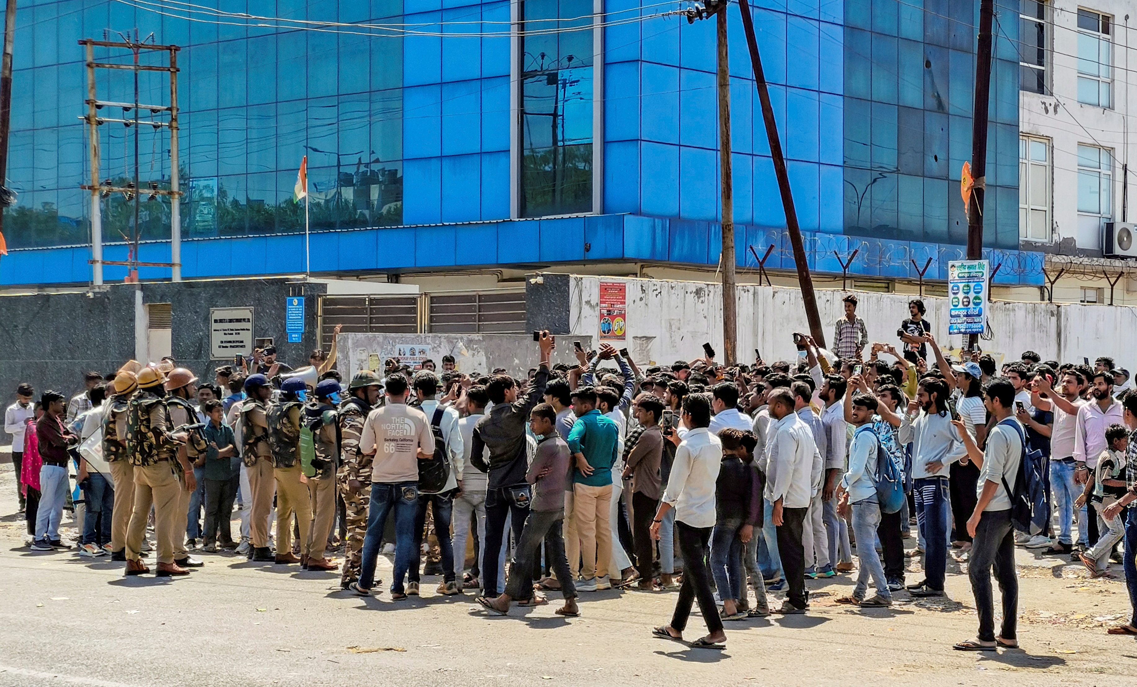 Noida: Factory workers during a protest demanding a hike in wages, in Noida, Gautam Buddh Nagar district, Uttar Pradesh, Monday, April 13, 2026. The protest carried incidents of arson, vandalism and stone-pelting reported from Phase-2 and Sector 60 areas, police said. (PTI Photo)