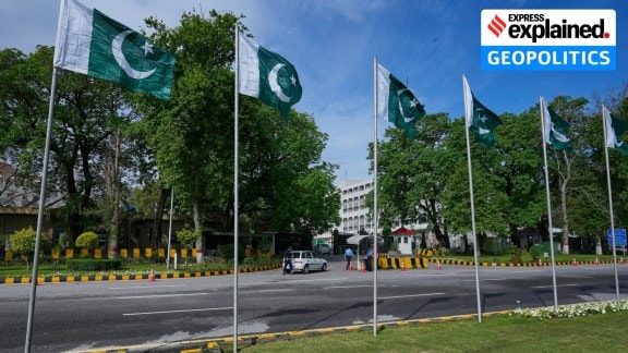 Security officers search a car at the entrance of Pakistan's foreign ministry, ahead of the mediation talks in relation to the United States and Iran in Islamabad on April 9. (AP Photo/Anjum Naveed)