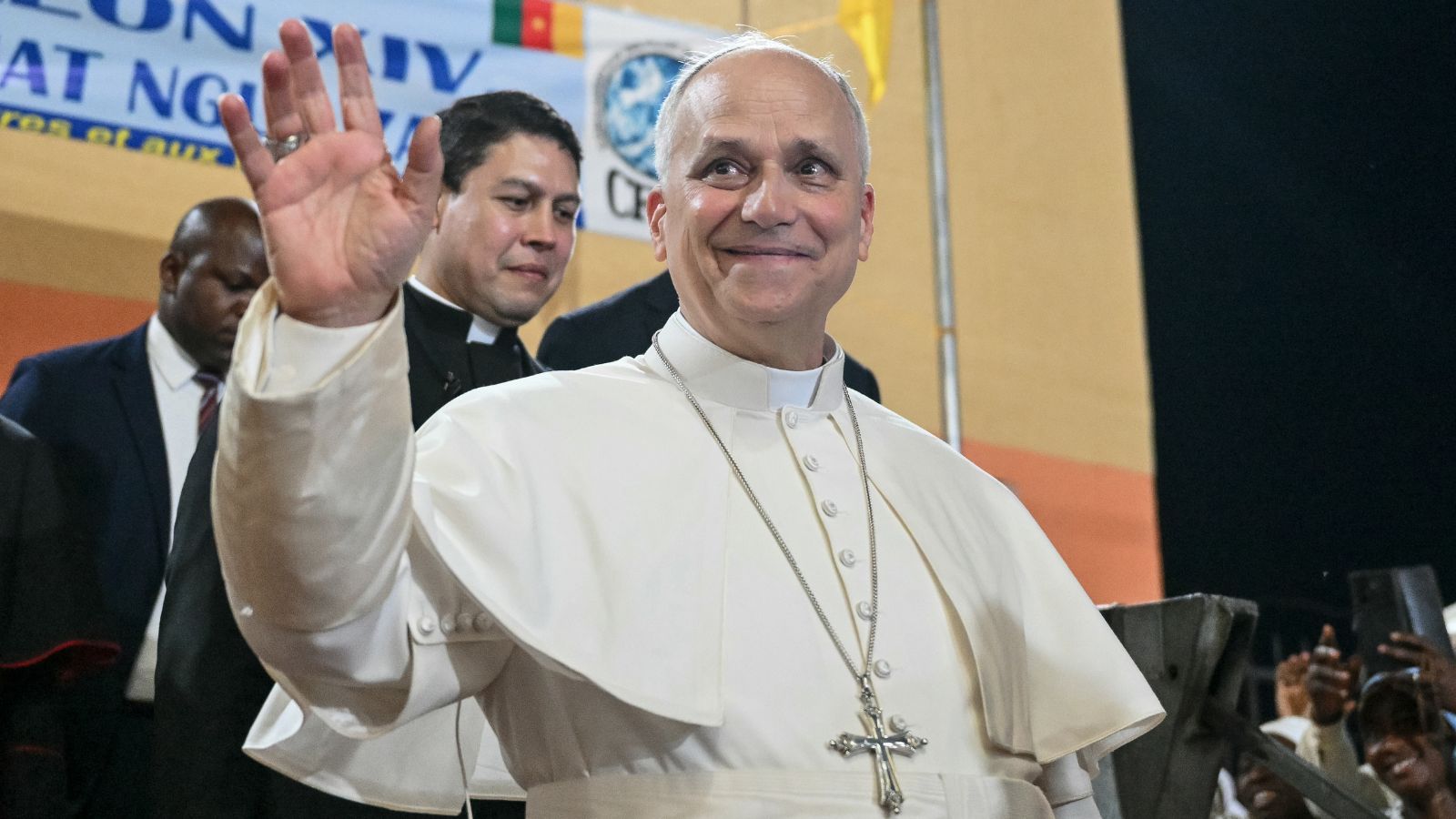 Pope Leo XIV waves to supporters as he leaves after his visit to the Ngul Zamba (Power of God) orphanage in Yaounde, Cameroon on the third day of his apostolic journey to Africa (Photo/AP)