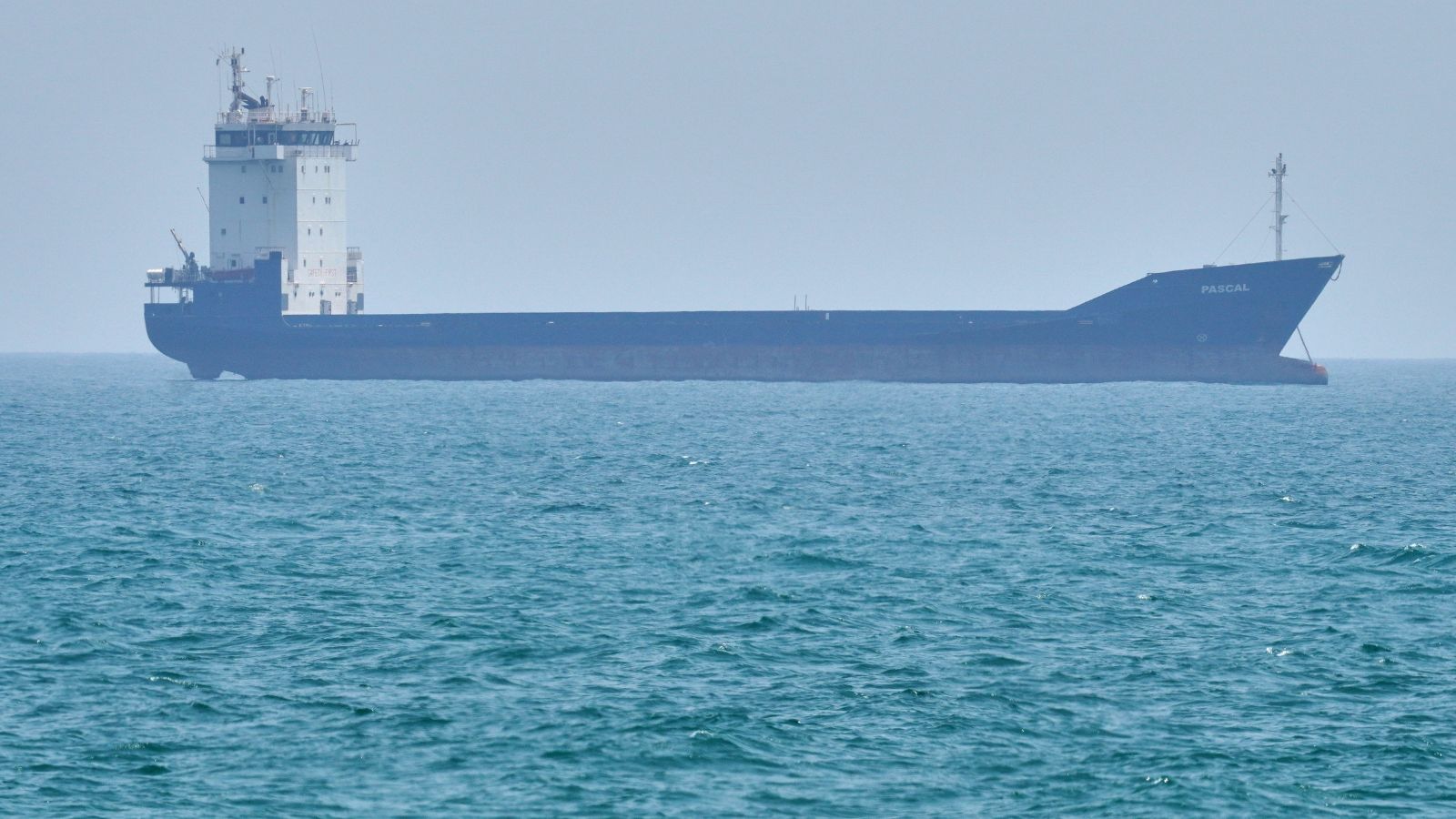 A tanker sits anchored in the Strait of Hormuz off the coast of Qeshm Island, Iran, Saturday, April 18, 2026. (AP Photo/Asghar Besharati)