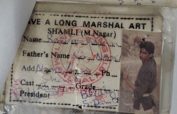 Samil’s photo on the identity card of a centre teaching Shaolin kung fu, the largest and best known style of the Chinese martial art, in Shamli. (Express Photo)