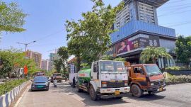Two water tankers parked side by side just meters away from the spot where a boy tragically lost his life after being hit by a water tanker two days ago. (Express Photo/Arul Horizon)