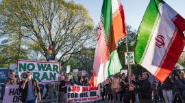Activists protest near the White House in Washington, Tuesday evening, April 7, 2026. (AP Photo)