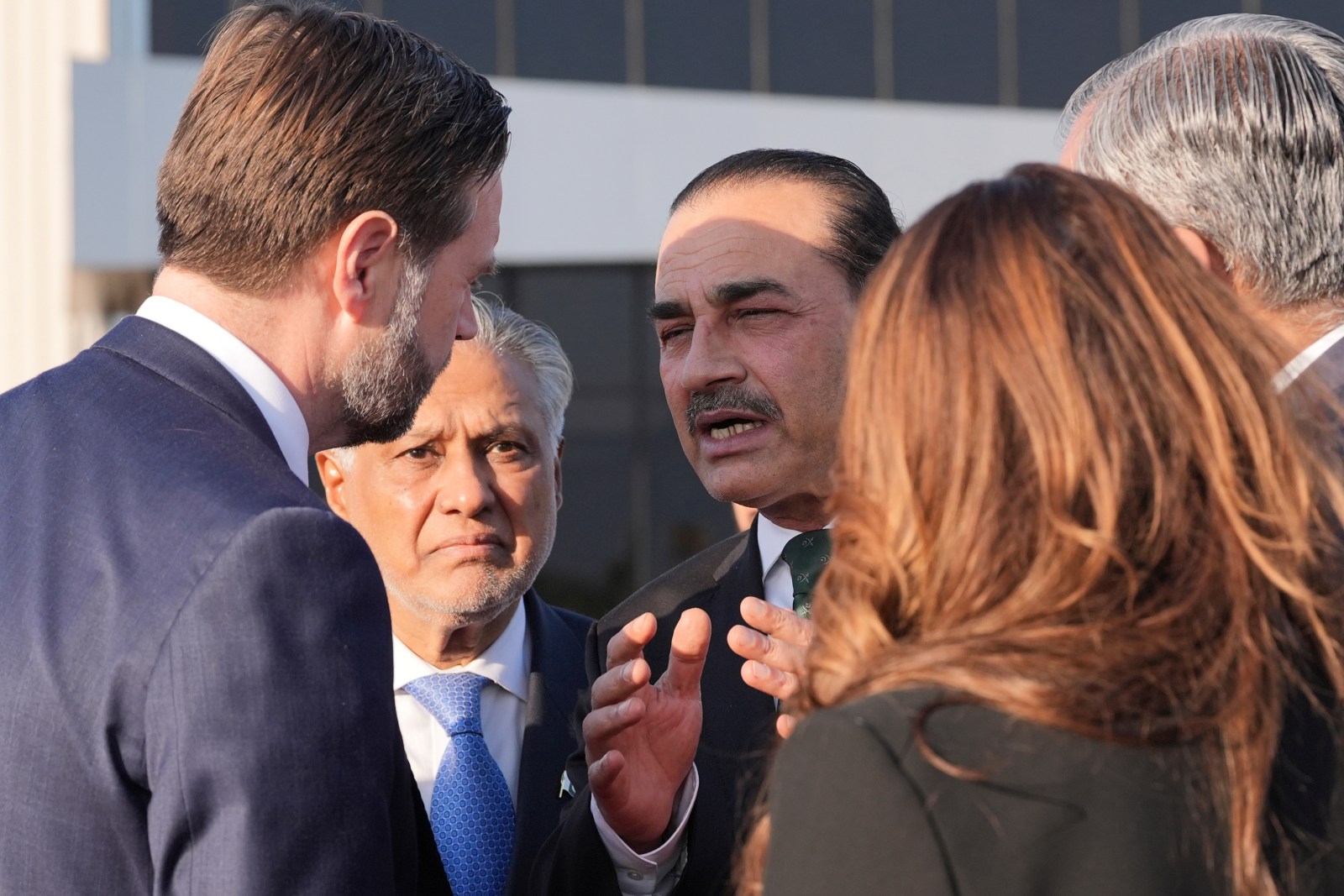 Vice President JD Vance, left, talks to Pakistan's Chief of Army Staff Field Marshall Asim Munir, right, and Pakistani Deputy Prime Minister Mohammad Ishaq Dar after attending talks in Islamabad. (AP Photo)
