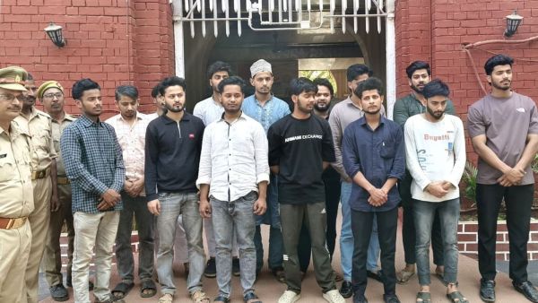 The youth who attended the iftar gathering in police custody in Varanasi. (Express Photo by Vishal Srivastav)