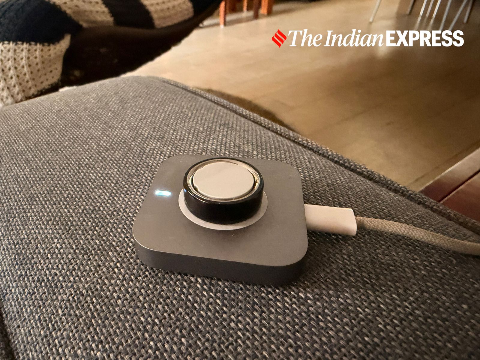 With roughly a week of battery life, the Oura Ring only needs an occasional top-up on its compact charging dock. (Image: Nandagopal Rajan/The Indian Express)