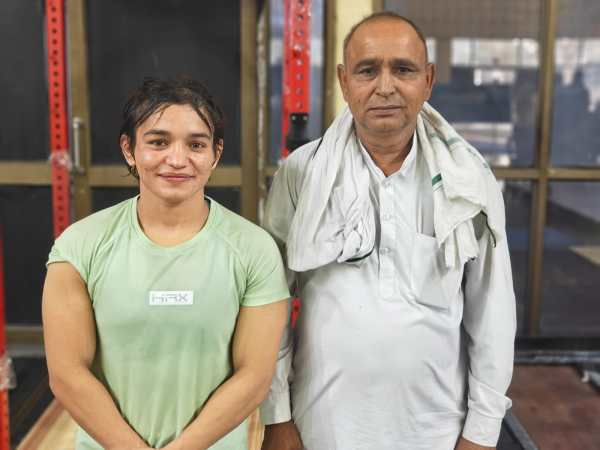 Meenakshi with father Prem Goyat. (Express Photo)