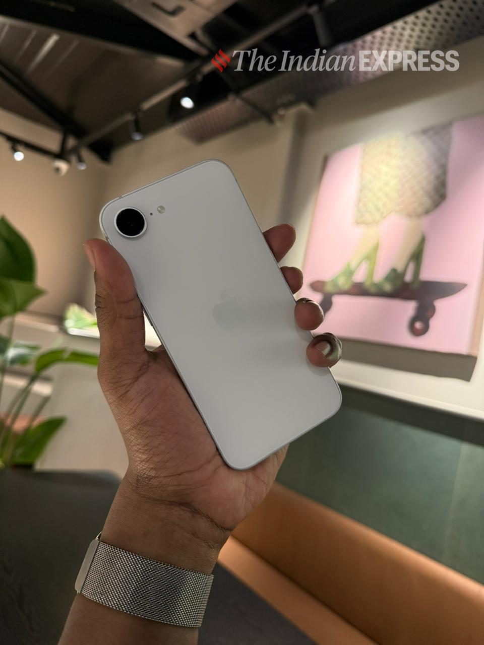 The compact form factor makes the iPhone 17e easy to hold and use one-handed. It’s a reminder that smaller phones can still feel complete. (Image: Bijin Jose/The Indian Express)