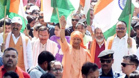 With a saffron scarf tied around his head to beat the heat, Uttar Pradesh CM Yogi Adityanath led the 20-minute ‘Jan Akrosh Mahila Padyatra’ from the CM’s official residence to the Vidhan Sabha. (Express Photo/Vishal Srivastav)