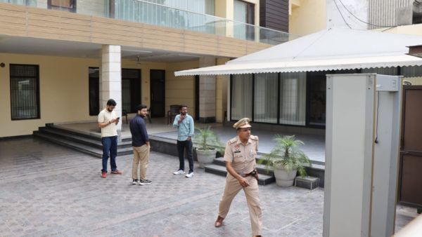 ED officials conducting raid at Arora’s residence in Gurdev Nagar of Ludhiana, Friday. (Express photo/:Gurmeet Singh)