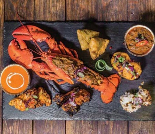 आशा के बर्मिंघम में सिग्नेचर व्यंजन।