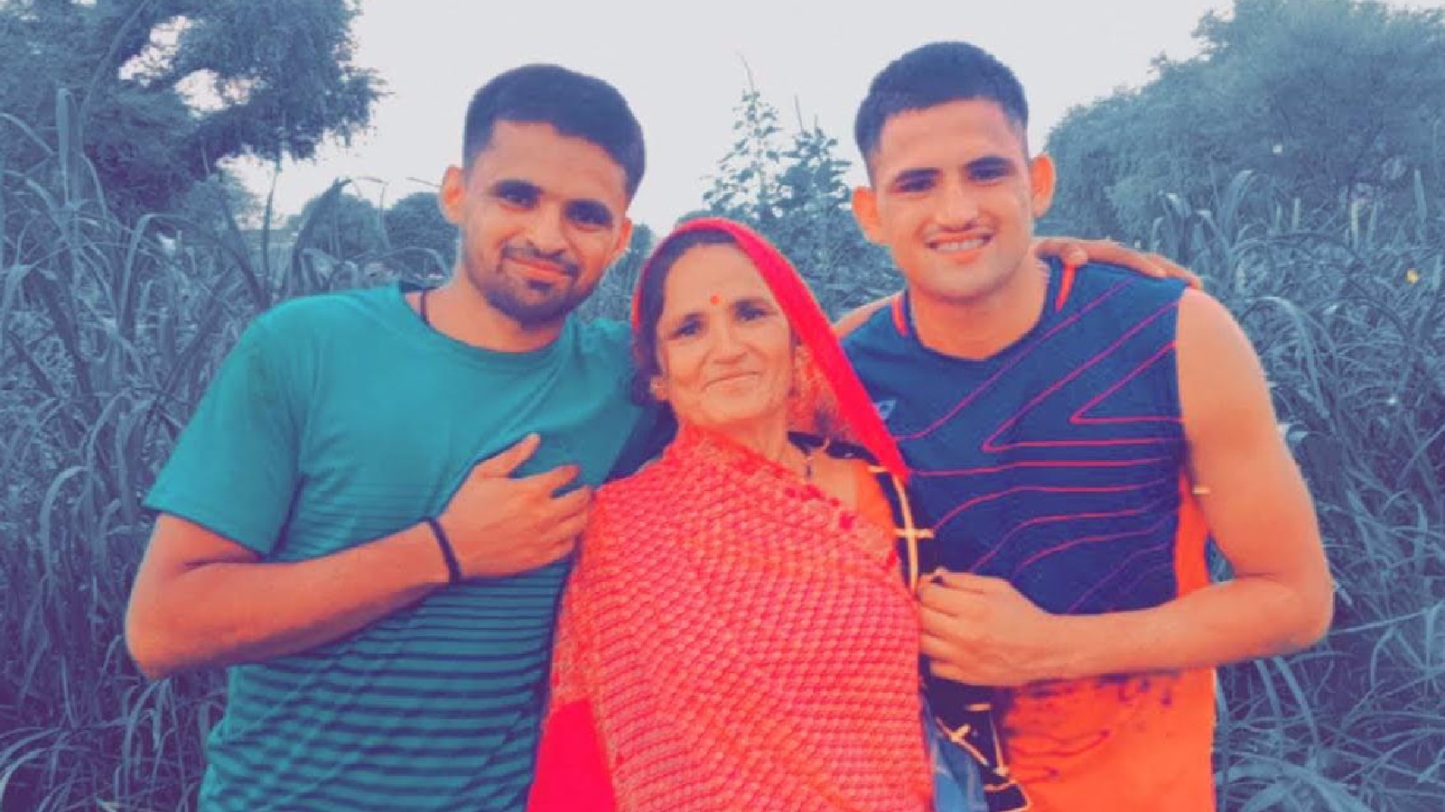 Ashok Sharma with his mother and brother. (Picture by special arrangement)