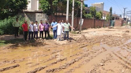 BJP leader Vineet Joshi speaks with residents at ChajjuMajra in Mohali. (Express Photo)