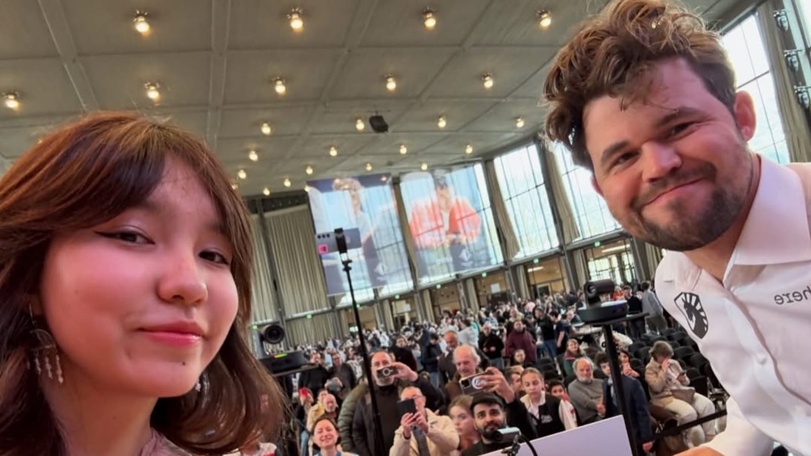 Why Magnus Carlsen agreed to a selfie with opponent, then immediately got arbiter to take away her phone Why Magnus Carlsen agreed to a selfie with opponent, then immediately got arbiter to take away her phone