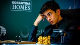 Uzbek chess prodigy Javokhir Sindarov makes his opening move in the Candidates chess tournament in Cyprus. (Photo: FIDE/Niki Riga)