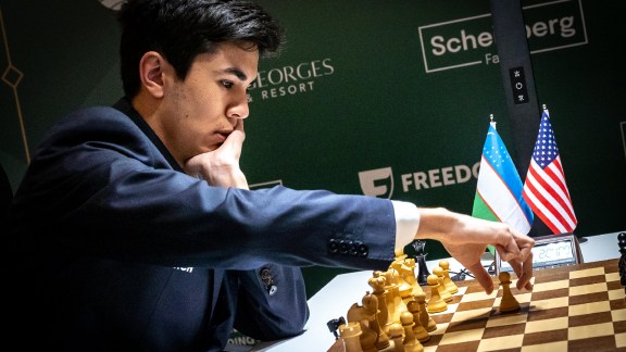 Uzbek chess prodigy Javokhir Sindarov makes his opening move in the Candidates chess tournament in Cyprus. (Photo: FIDE/Niki Riga)