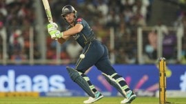 Gujarat Titans' Jos Buttler watches the ball after playing a shot during an Indian Premier League cricket match. (Photo: AP)