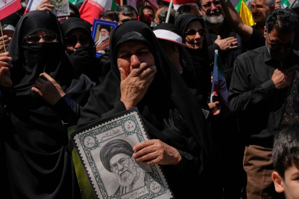 Government supporters mourn in a ceremony marking the 40th day since the killing of Iranian Supreme Leader Ayatollah Ali Khamenei, in Tehran, Iran, Thursday, April 9, 2026. (AP Photo/Vahid Salemi)