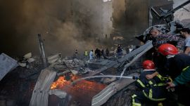 Firefighters try to put out flames at the site of an Israeli airstrike that struck an apartment building in Beirut, Lebanon, Wednesday, April 8, 2026. (AP Photo)