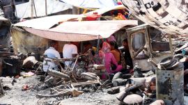 Lucknow slum fire updates: Residents look through the charred remains of their homes for anything they can salvage.