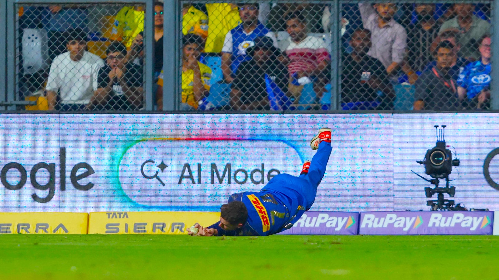 Mitchell Santner of Mumbai Indians takes a catch to dismiss  Kartik Sharma of Chennai Super Kings in an IPL 2026 match at Wankhede Stadium. (Photo: Vipin Pawar / CREIMAS for IPL)
