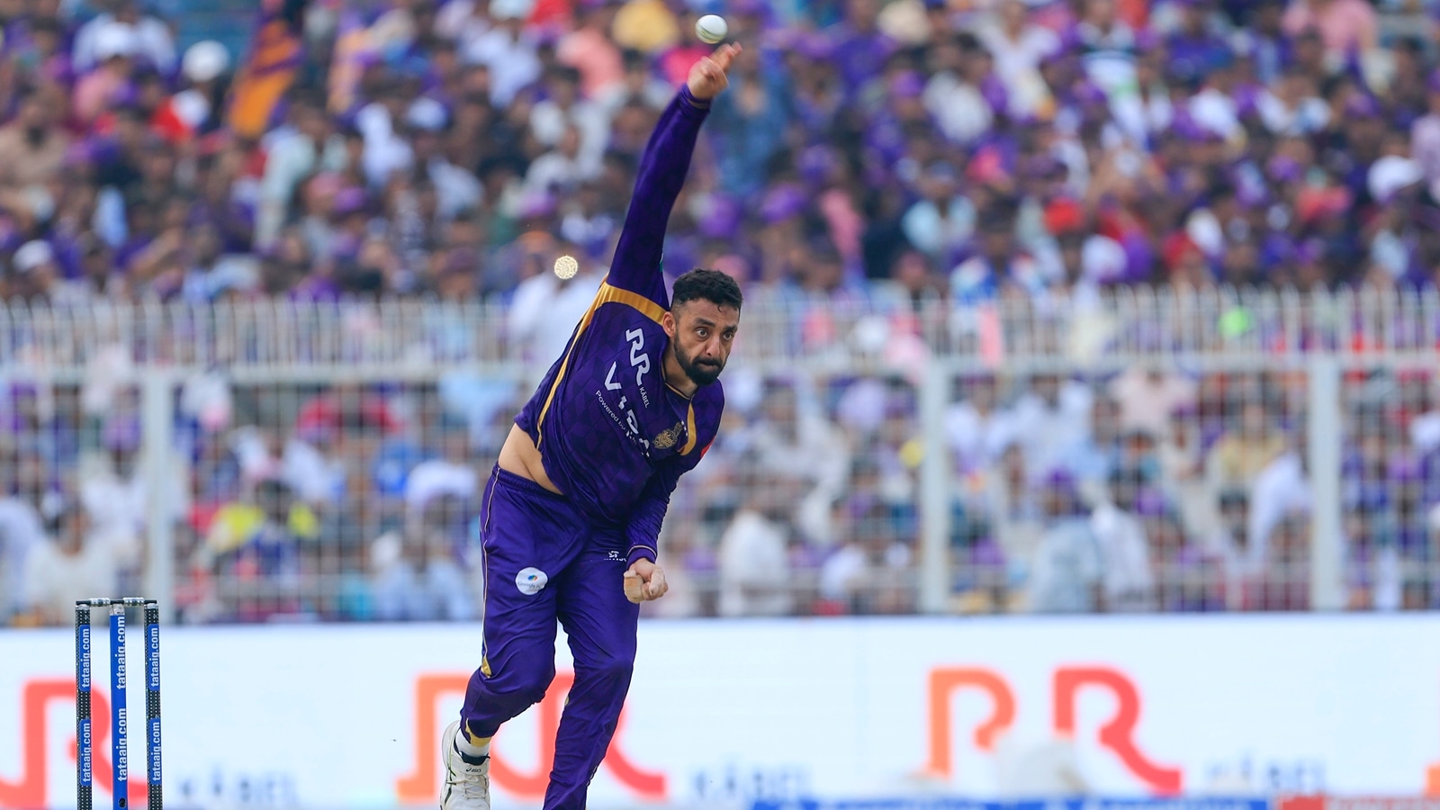 Chakaravarthy's spell of 3/14 in four overs – including the scalp of teenage sensation Vaibhav Sooryavanshi - on a helpful pitch pulled back the visitors. (BCCI/Creimas Photo)