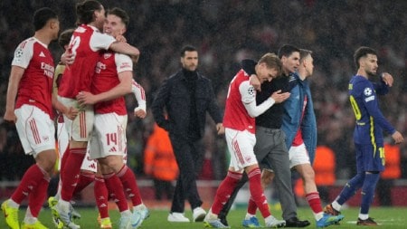 Arsenal's manager Mikel Arteta embraces Martin Odegaard and Leandro Trossard, right, at the the end of a Champions League semifinal, second leg, soccer match between Arsenal FC and Atletico Madrid at Emirates Stadium in London. (AP Photo)
