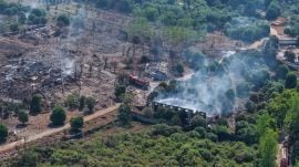 Nearly 500 rescuers were deployed to the scene and people staying in danger zones were evacuated by authorities. (Xinhua via AP)