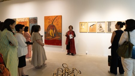 Curator Gayatri Sinha conducting a walkthrough of the exhibition "Reverie. Pause. Rupture" at Anant Art