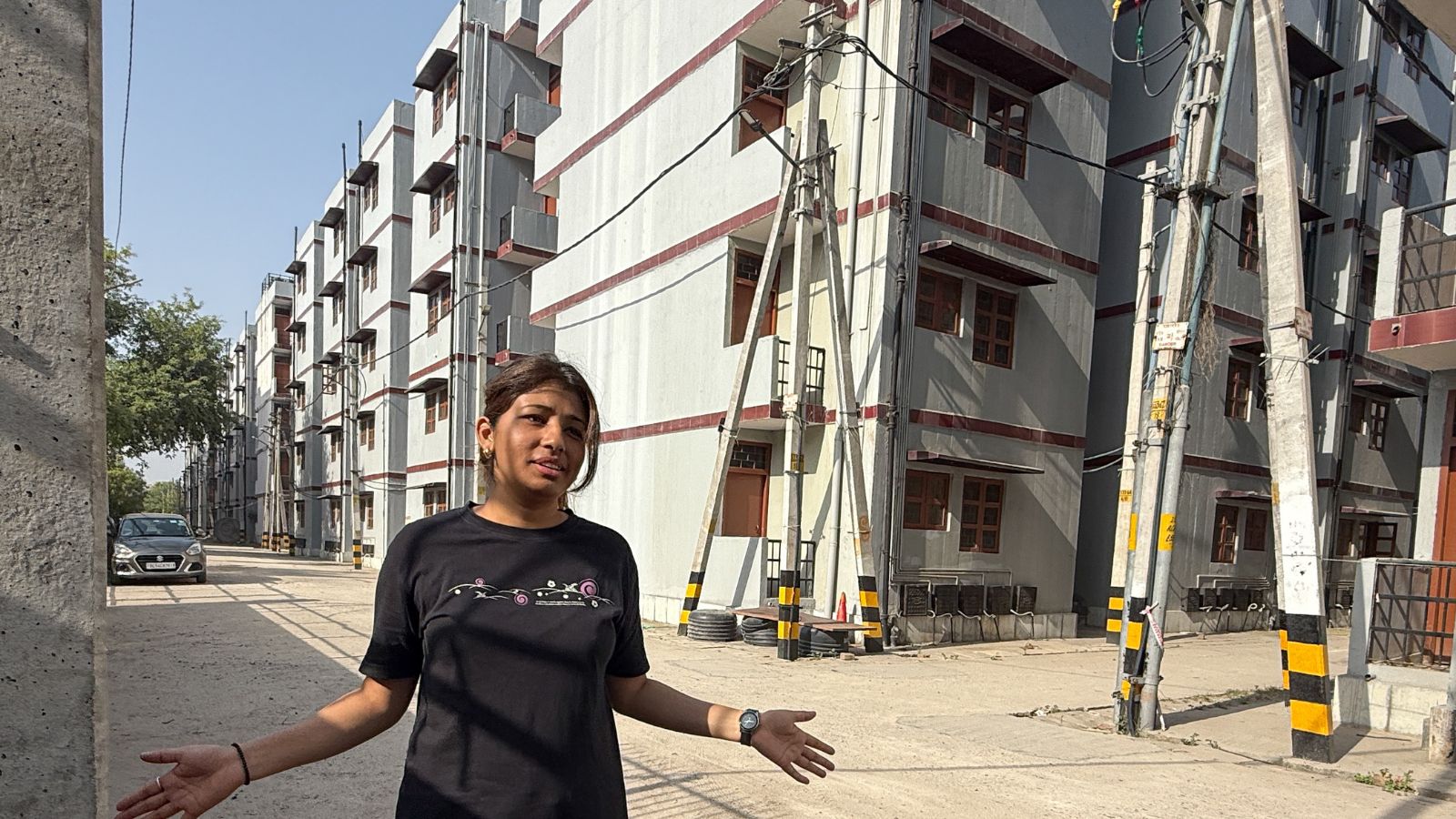 Preeti, who recently shifted with her family from BR Camp cluster to new flat of Savda Ghevra Apartments, in New Delhi on Tuesday. (Express Photo by Praveen Khanna)