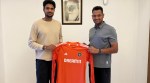 Gurnoor Brar (Left) with coach Varinder Singh. (Photo by special arrangement)