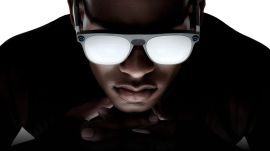 Instead of operating independently, the glasses remain connected to a small external computing puck that powers the experience. Users are expected to carry the phone-sized accessory in their pocket while using the glasses. (Image: Xreal)