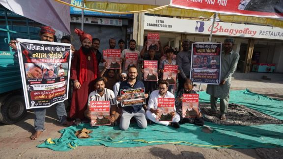 A group of 15-20 men have been sitting on dharna outside Vejalpul Police station for the last three days
