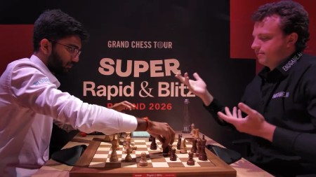 Hans Niemann reacts to world champion D Gukesh pressing his clock while two pieces were still rolling on the board. (Screengrab via Saint Louis Chess Club YouTube)