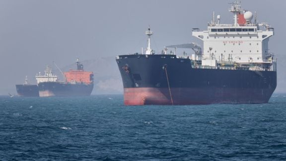 Oil tankers sit at anchor offshore in the Strait of Hormuz off Bandar Abbas, Iran, Saturday. (AP/PTI)