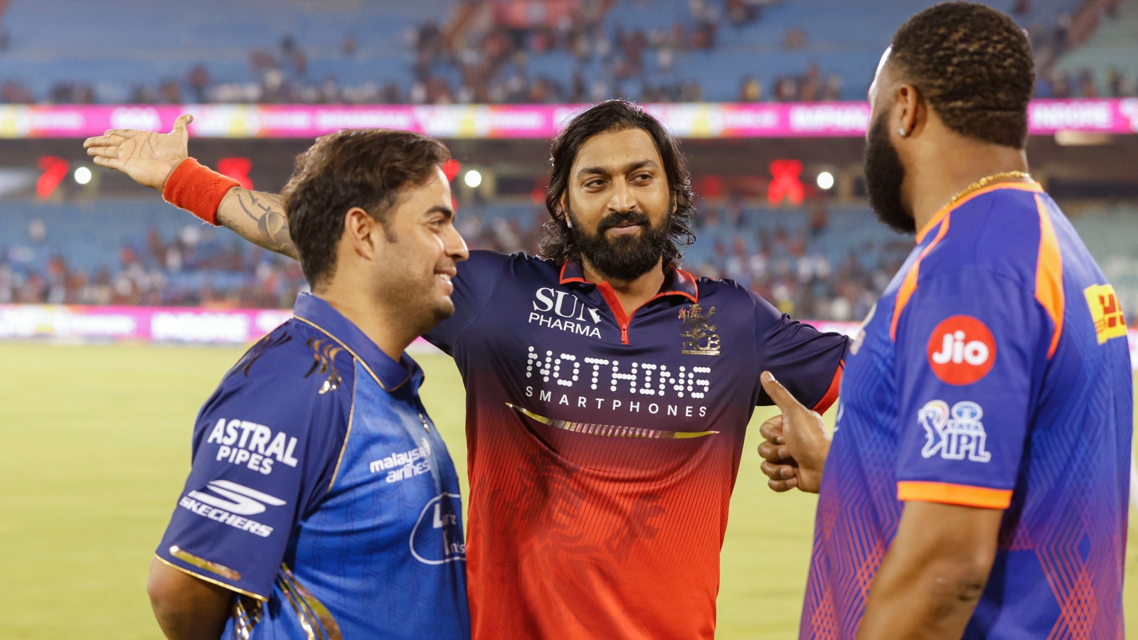 RCB's Krunal Pandya (C) with MI owner Anant Ambani (L) and MI batting coach Kieron Pollard. (CREIMAS FOR IPL)