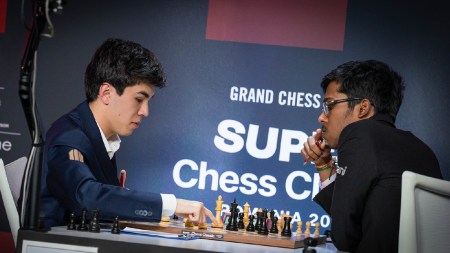 Javokhir Sindarov mulls his next move against India's R Praggnanandhaa in a round 2 clash of the Super Chess Classic 2026 tournament in Romania. (Photo: Lennart Ootes/Grand Chess Tour)