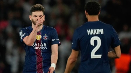 PSG's Khvicha Kvaratskhelia celebrates with Achraf Hakimi after scoring his side's fourth goal during the Champions League semifinal first leg soccer match between Paris Saint-Germain and Bayern Munich in Paris, Tuesday, April 28, 2026. (AP Photo)