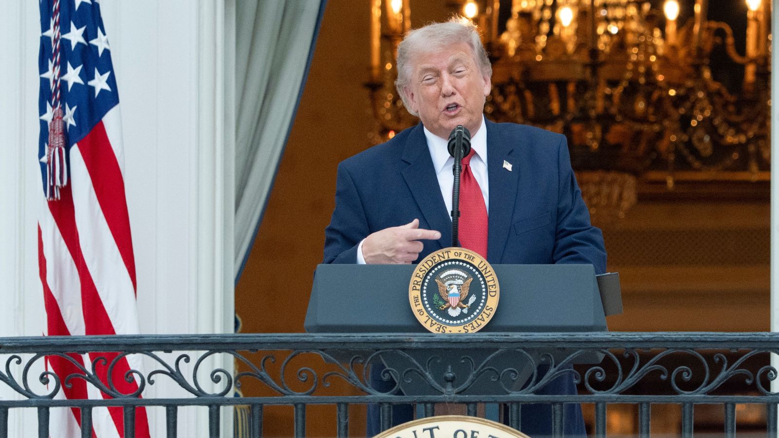 US President Donald Trump as he addresses the attendees from the Blue Room Balcony of the White House during the annual Congressional Picnic on the South Lawn (AP Photo)