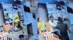 Despite the frightening sight, the three staff members can be seen fighting back