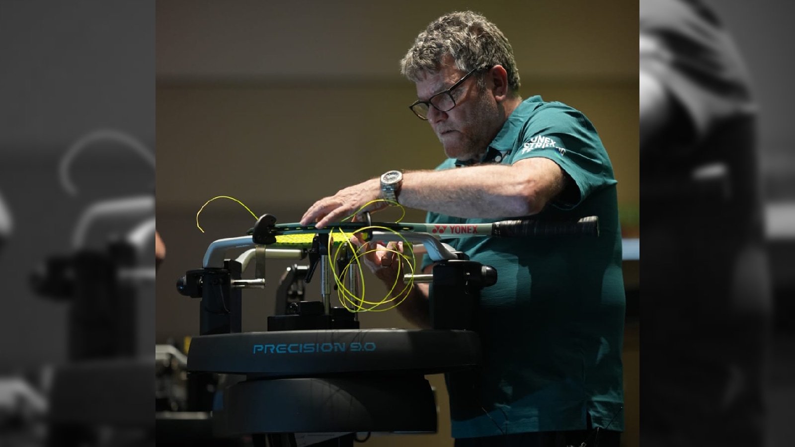 Tim Willis stringing a racquet during the Stringing Workshop in India. (Photo: Yonex)