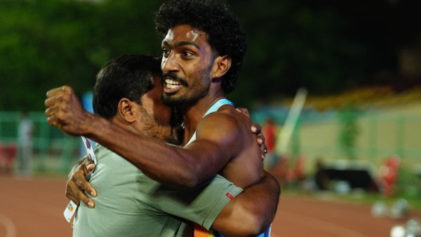 Vishal T K with his father, Thennarasu, after becoming the first Indian to run a sub-45 seconds 400 metres race. (AFI)