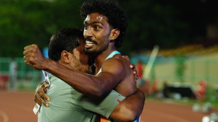 Vishal T K with his father, Thennarasu, after becoming the first Indian to run a sub-45 seconds 400 metres race. (AFI)
