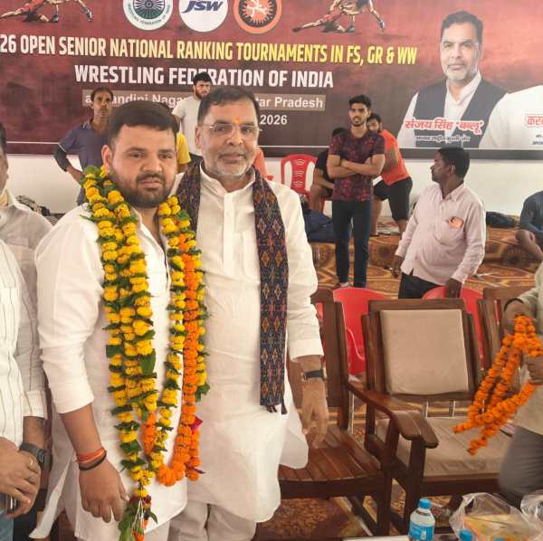 Karan Bhushan Singh (left) the Kaiserganj MP, UP wrestling chief and son for ex-WFI president Brij Bhushan Saran Singh being felicitated by WFI president Sanjay Singh in Gonda on Tuesday. Credit: Express Photo.