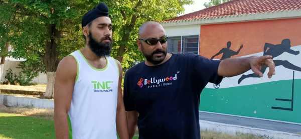 Gurinderveer Singh with coach Sarabjeet Singh Happy. (Special Arrangement)